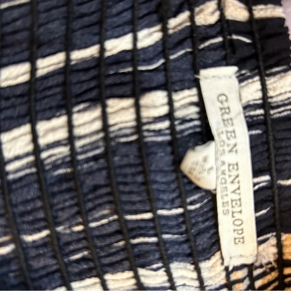 Green Envelope black/white striped pants. Size Large.